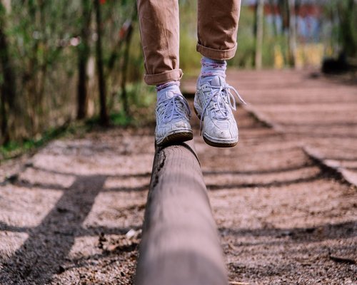 A person walking up stairs in an urban setting